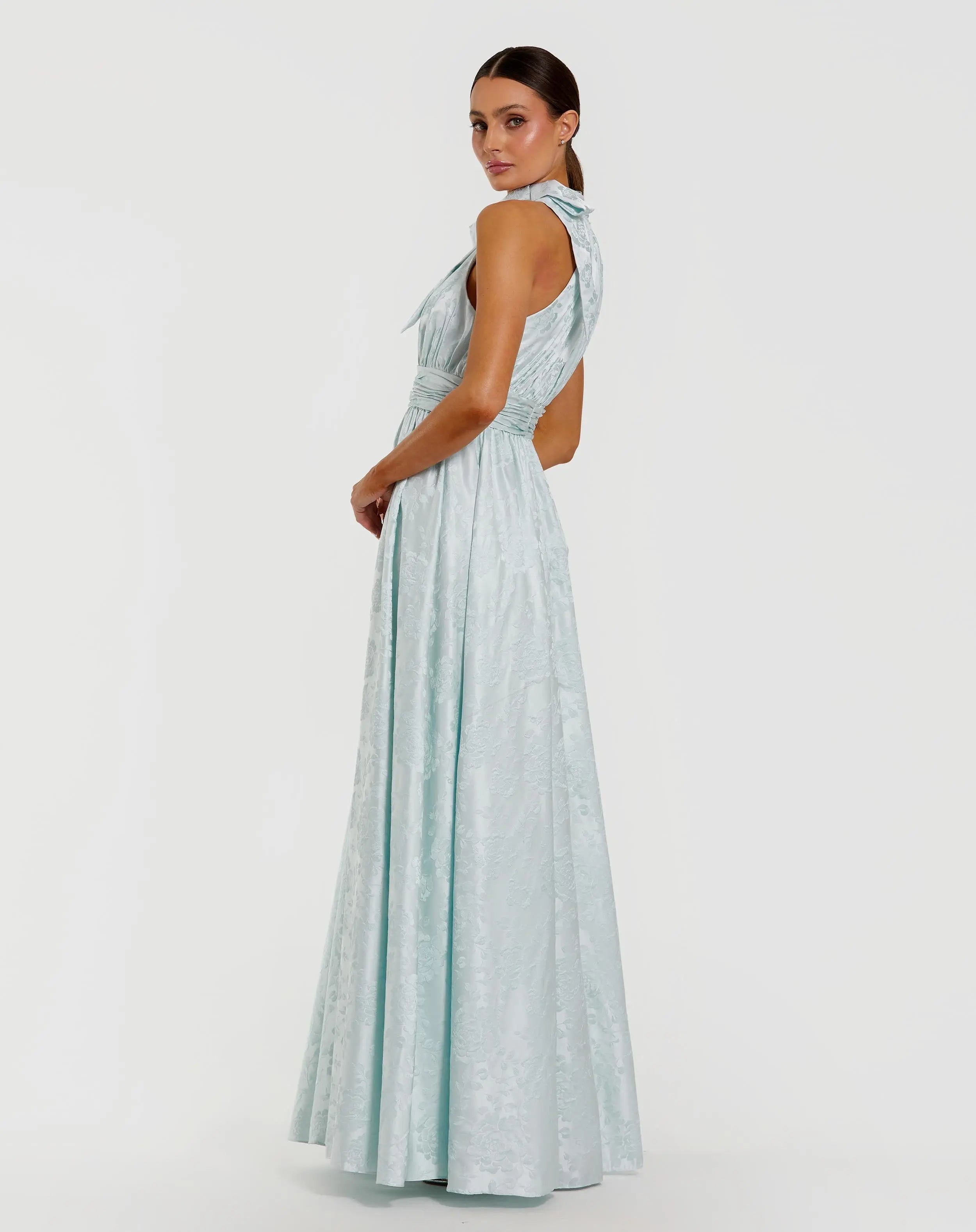 Blue Sleeveless Halter Neck Brocade Gown With Bow Detail